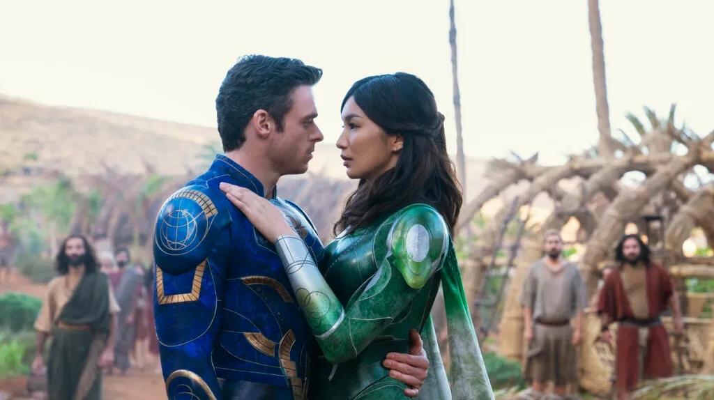 (L-R): Ikaris (Richard Madden) and Sersi (Gemma Chan) in Marvel Studios’ ETERNALS. Photo: Sophie Mutevelian ©Marvel Studios 2021. All Rights Reserved.